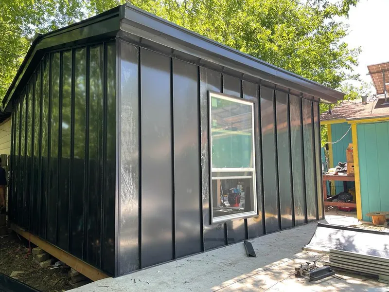 Black standing seam metal wall panels for Roof Inspection in Warren