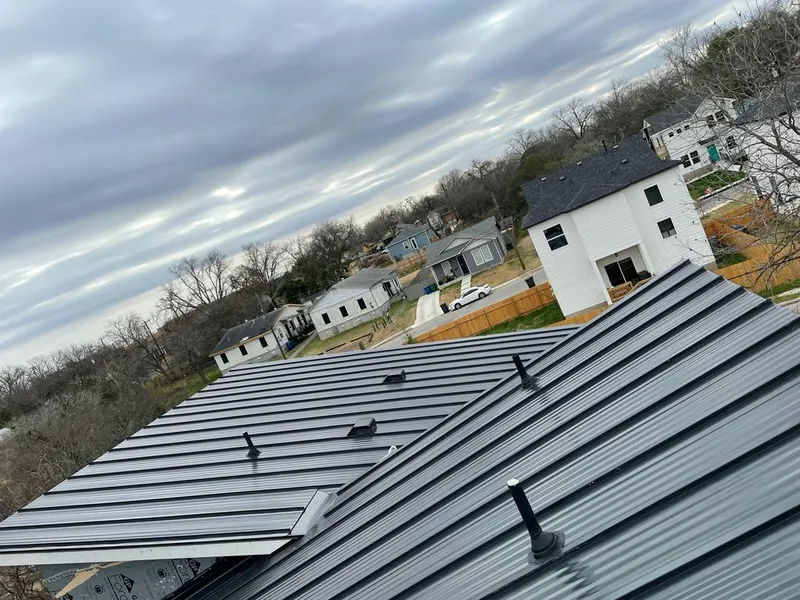 Standing seam metal roof panels with vents for Skylight Repair in Warren
